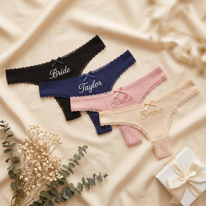 Personalised embroidered thong - White with custom name on waistband in teal cursive | SweetCarry
