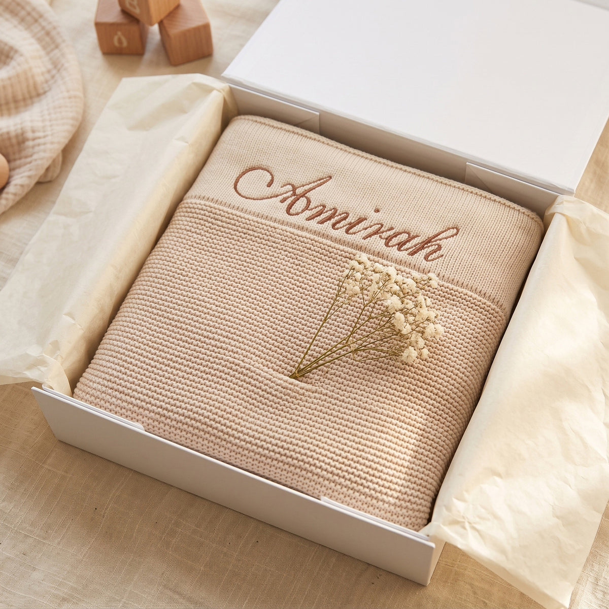 Personalised Knit Baby Blanket - name in cursive on ribbed border band | SweetCarry